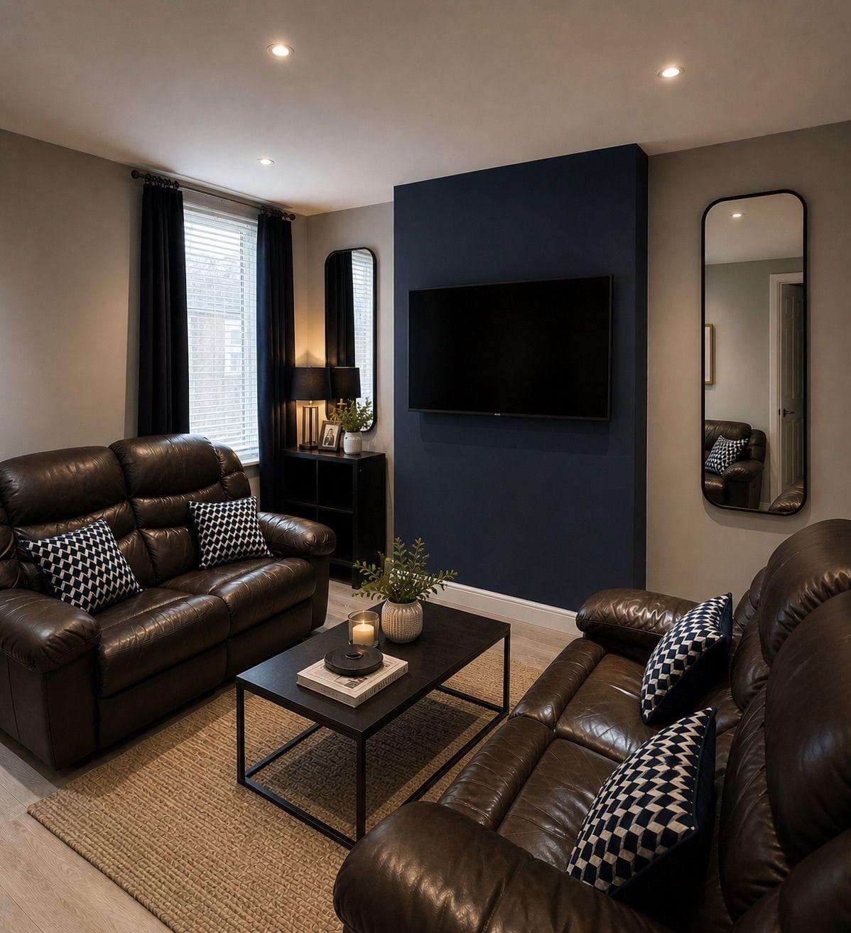 Lounge with leather sofas and wall-mounted smart TV at 16 Carlton Road, Shelton